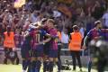 برشلونة يهزم ريال مدريد ويقترب من حصد لقب الدوري الإسباني