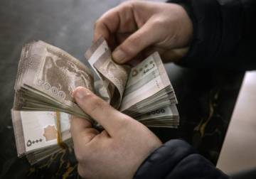 تحسن في سعر صرف الليرة السورية أمام الدولار