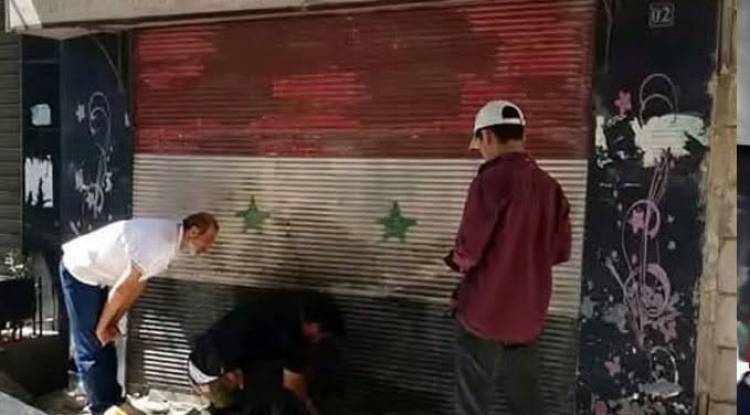 إغلاق 27 محلاً تجارياً في دمشق بالشمع الأحمر لعدم إزالة رموز النظام البائد