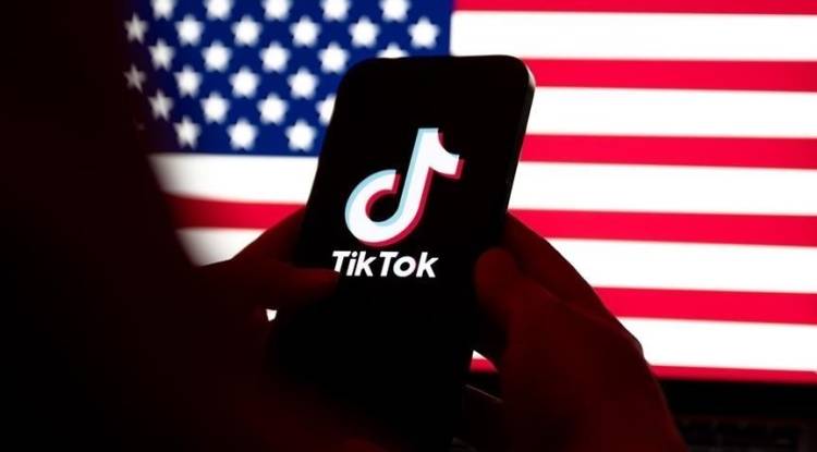 الصين تدعو إلى حلول قانونية متوازنة لصفقة 