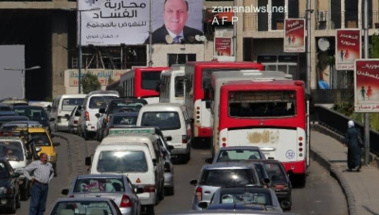 ملصق وسط دمشق لمرشح رئاسة الجمهورية العربية السورية حسان النوري وملصقات للمرشح الثاني ماهر حجار…!